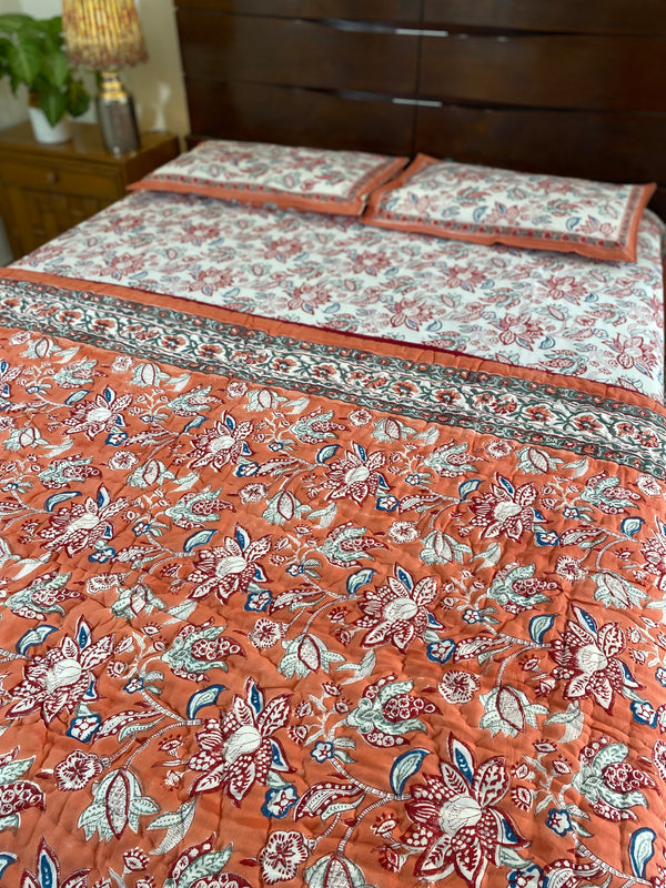 Orange and White Floral Bedsheet and Reversible Quilt Set