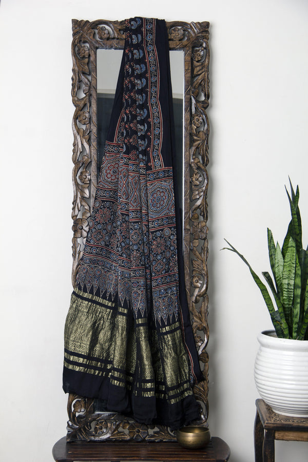 Bagh collection- Black floral Ajrakh Modal silk saree