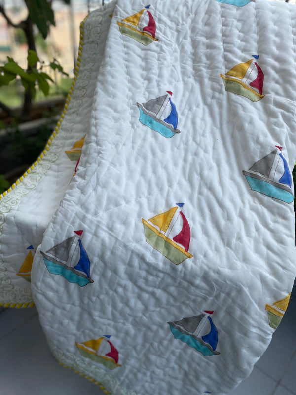 Boat print reversible baby quilt