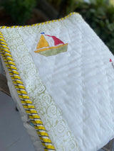 Boat print reversible baby quilt