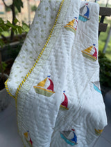 Boat print reversible baby quilt